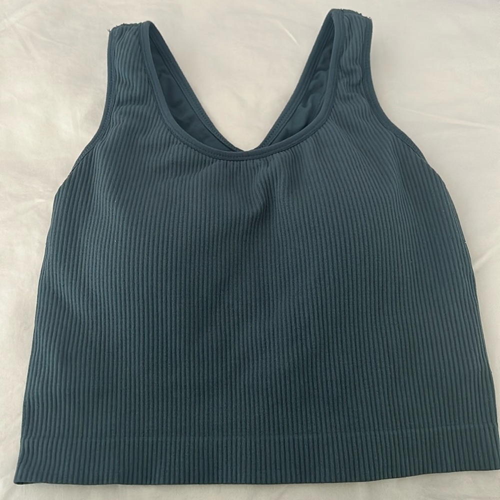 This is a sports top from Calia. It is an xs and has been worn about 10 times.